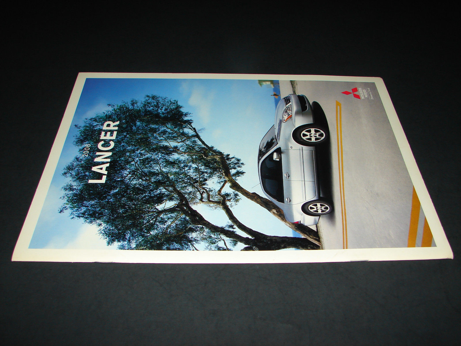 2006 Mitsubishi LANCER Automobile Dealership Brochure car DRIVEN TO THRILL Triad Item image 2
