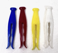 4 Vintage Kordite Clothes Pins Red Blue Yellow White 2 3/4 inches long - $17.25 CAD