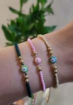 handmade bracelet with Turkish evil eye charm - $224.94 MXN