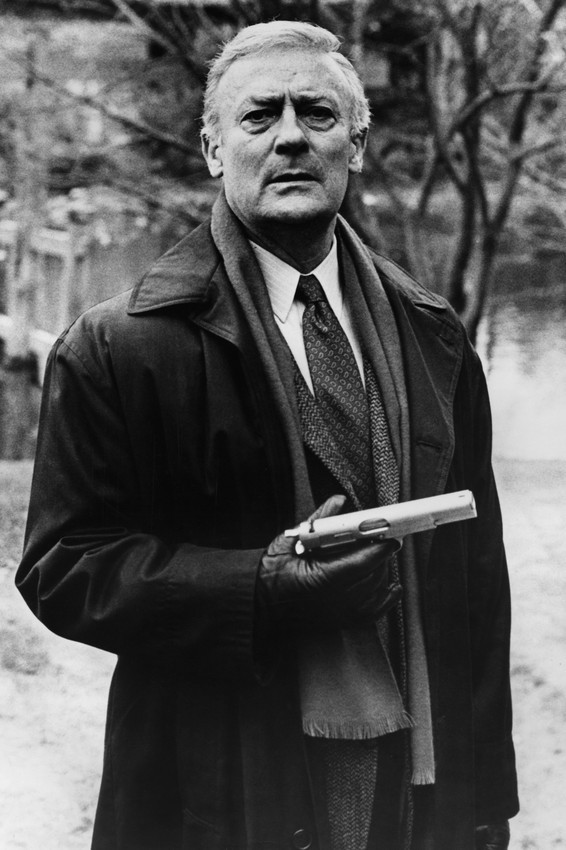 Edward Woodward in The Equalizer as Robert McCall in Black Raincoat Holding Gun  - $23.99