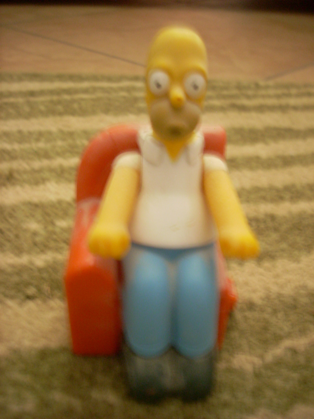 Homer Simpson plastic figurine arms go up and down - $10.00