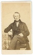 CIRCA 1880&#39;S CDV Featuring Stern Looking Man Sitting in Chair Wearing Suit &amp; Tie - £7.44 GBP