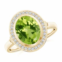 ANGARA Bezel-Set Oval Peridot Ring with Diamond Halo for Women in 14K Solid Gold - £1,049.23 GBP