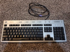 Vintage Compaq Wired PS/2 Keyboard  5187-5023 Silver Black - $361.69 MXN