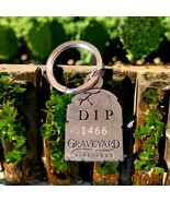 DIP Graveyard 1466 Vineyard Headstone silver keychain - $443.26 MXN