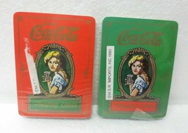 1980 Set of Two Sealed Playing Cards in Tin Box that has a dent - $5.20