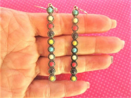 Long turquoise bead drop earrings - $187.52 MXN