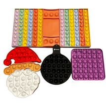 Fidgets poppers lot Santa board game &amp; more - $14.40