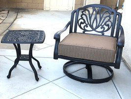 Patio set of 2 cast aluminum 1 swivel club chair and  Elisabeth end table. - $895.00