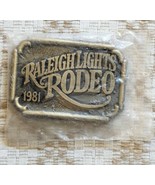 RALEIGH LIGHTS RODEO solid brass belt buckle 1981 New Old Stock in Package - $17.41