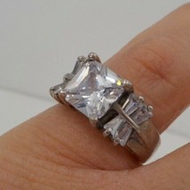 PRINCESS CUT STONE ACCENT STONES WOMENS SIZE 6 RING SILVER COLOR FASHION... - $14.99