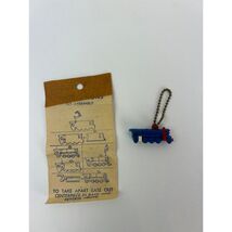 Vintage 1950s Steam Locomotive Puzzle Key Chain Toy on Original Card - $45.00