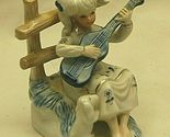 Porcelain Girl Playing Guitar Puppy Dog Sitting Near Fence Figurine - $12.86