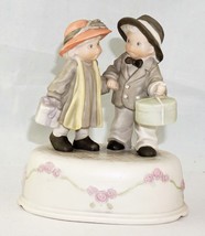 Enesco Music Box Figurine of a Boy and Girl Holding Hands Carrying Gifts - £20.01 GBP