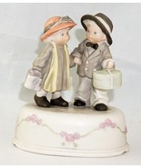 Enesco Music Box Figurine of a Boy and Girl Holding Hands Carrying Gifts - £20.18 GBP