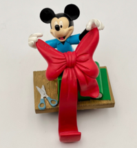 Vintage Disney Mickey Unlimited Santa&#39;s Best Stocking Holder Red Bow Hanger - £24.53 GBP