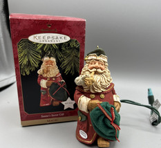 Ornament Hallmark Keepsake Santa&#39;s Secret gift Magic Series 1997 4&quot; Tall Signed - £8.22 GBP