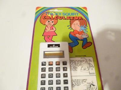 OLDER TOY -TRICKY SQUIRTING CALCULATOR- MINT   STILL SEALED H25 - $4.55
