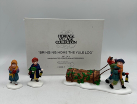 Department 56 Bringing Home the Yule Log 5558-1 Heritage Village - $19.24