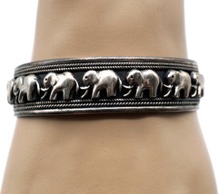 Tibetan Silver Handmade Cuff Bracelet with Parade of 3D Elephants - $45.50