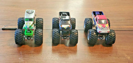 Hot Wheels Airborne Ranger,Grave Digger Bad To The Bone &amp;Va Giant Monster Trucks - £11.69 GBP