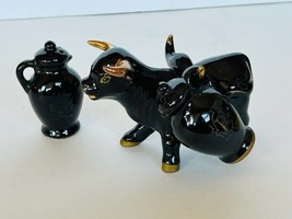 Salt Pepper Shakers vtg figurines 1950s Japan Black Gold Bull Cow saddle pots  - £34.87 GBP