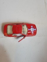 Vintage 1990s Diecast Toy Matchbox Ripper BMW 850i Red 1992 Skull Crossbones - $9.56