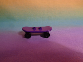LEGO Purple Skateboard Parts and Pieces - $1.82