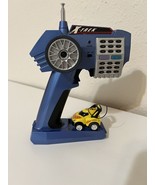 SILVERLIT X-TREK  RC REMOTE CONTROL 49MHZ WITH MICRO RACE CAR. - $25.65 CAD