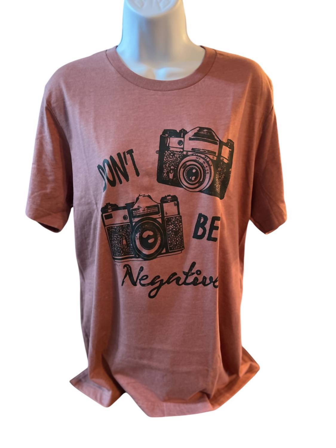 Bella + Canvas women's don't be negative t-shirt in Dusty Pink - size 2XL