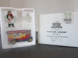Dept 56  59587 Popcorn Vendor 2 pieces  L138 - $8.50