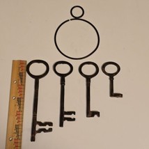 Skeleton Keys Cast Iron Lot of 4 Large Keys on Iron Ring Vintage 2.75&quot; - 6.25&quot; - $29.65