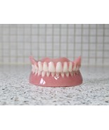 Full upper and lower dentures/false teeth, Brand new. - $135.00