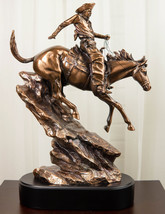 Ebros Rustic Wild West Cowboy Bandit Racing Down Rocky Slope On Horse Statue - £117.97 GBP