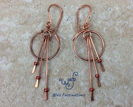 Handmade copper earrings: small hoops and three long dangles with red beads - $28.00
