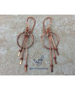 Handmade copper earrings: small hoops and three long dangles with red beads - €23,96 EUR