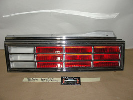 OEM 80 Pontiac Phoenix RIGHT PASSENGER SIDE TAIL LIGHT LENS BEZEL TRIM A... - $927.78 MXN