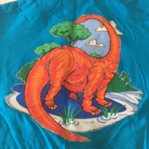 Retro youth size T shirt with large orange dinosaur graphics on back - $19.75