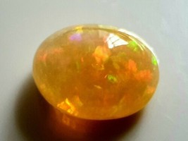26.70 ct Natural Welo Opal orange fire from Ethiopia - £2,158.26 GBP