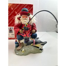 Vintage Possible Dreams Clothtique Ice Fishing Santa Figurine with Penguin - $931.81 MXN