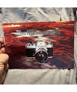 NIKON NIKKORMAT EL CAMERA SYSTEM  BOOKLET - $8.75