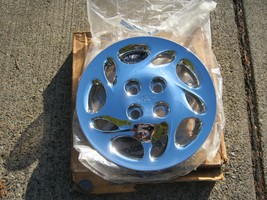 One NOS genuine 1998 to 2000 Ford Escort 14 inch chrome hubcap wheel cover - $27.70
