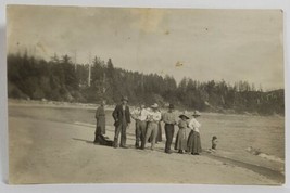 RPPC Photo on The Beach Child Kneeling in Water Ladies Large Hat Postcar... - $13.95