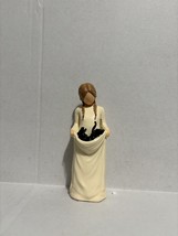 Woman Holding Black Cat In Her Apron - $380.72 MXN