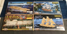 Lot of 4 Large Wood Puzzle 3D Kits Train Aircraft Carrier Pirate Ship Sa... - £30.23 GBP