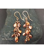Handmade copper earrings: chainlink waterfall of iridescent glass pip beads - $410.43 MXN