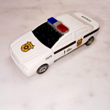 COLLECTIBLE WHITE POLICE CAR 5858 LIGHTER - $34.65