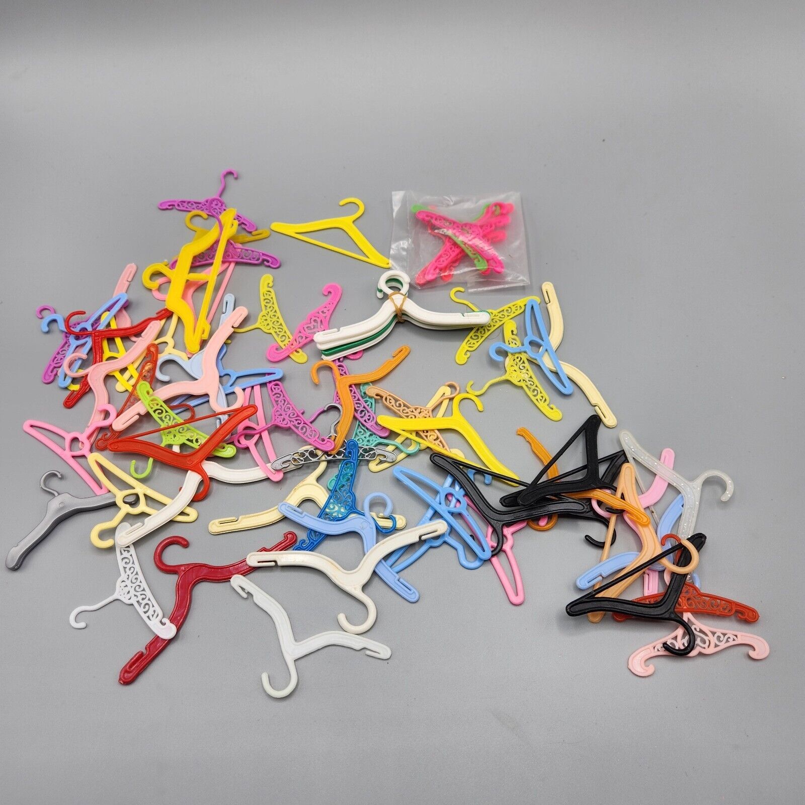 Barbie Skipper Doll Clothes Hangers Lot Plastic Multicolor 1960s to 1990s - £22.68 GBP