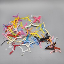 Barbie Skipper Doll Clothes Hangers Lot Plastic Multicolor 1960s to 1990s - $29.02