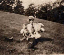 RPPC Man Sitting Alone in Field with 2 Antique Dolls Mr Tom Gibbons Postcard H30 - £23.66 GBP